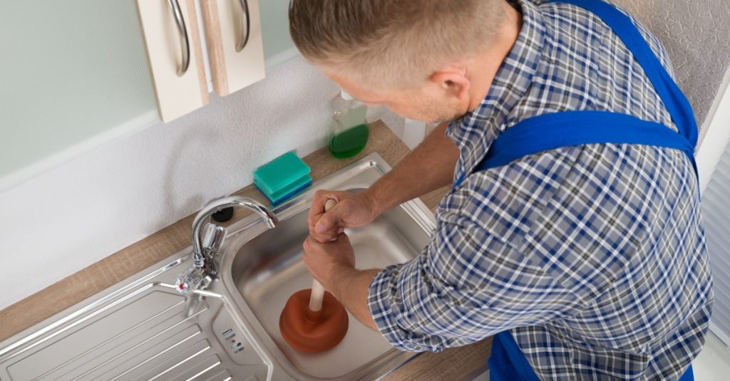 How to unblock a drain using household items