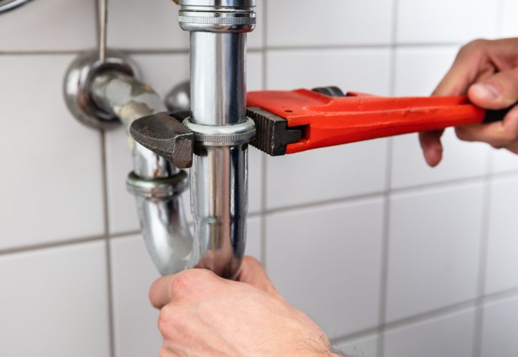 pipe wrench to unblock sink